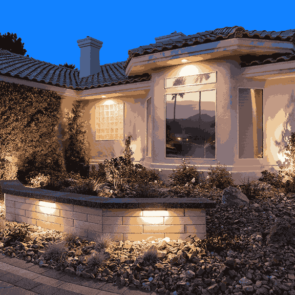 home with landscape lighting installation showing dramatic nighttime transformation